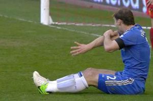 Luis (Chelseas-Branislav-Ivanovic-inspects-his-arm-after-being-bitten-by-Luis-Suarez)